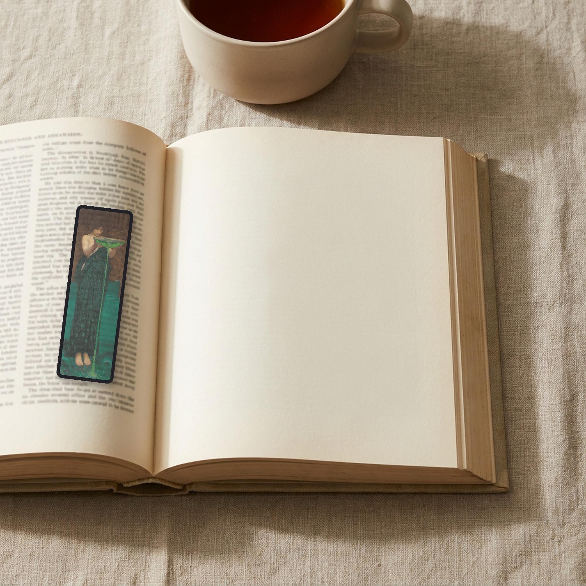 The Poisoner of the Sea Odyssey bookmark lying on an open book, the page text visible through the sheer organza