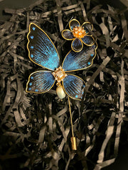 The Ronghua Butterfly Brooch — sapphire silk velvet-flower butterfly with pearl drop, gold stick pin, in its gift box
