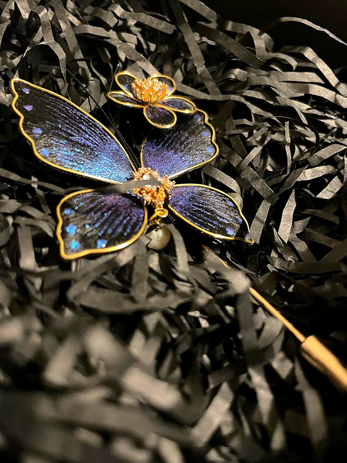 The Ronghua Butterfly Brooch — sapphire silk velvet-flower butterfly with pearl drop, gold stick pin, in its gift box