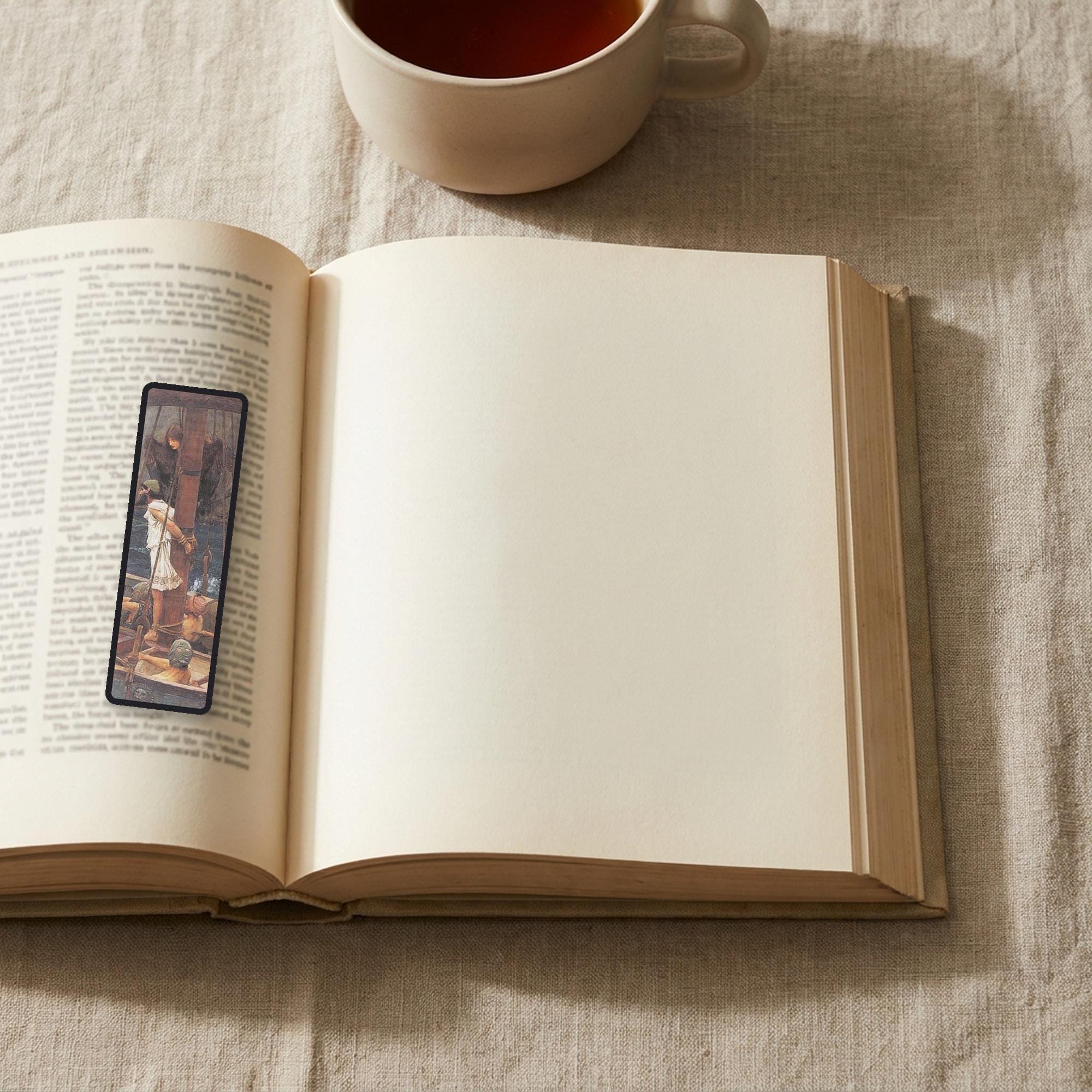 Bound to the Mast Odyssey bookmark lying on an open book, the page text visible through the sheer organza