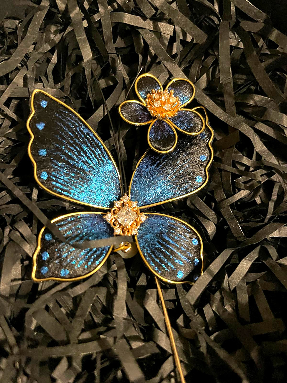 The Ronghua Butterfly Brooch — sapphire silk velvet-flower butterfly with pearl drop, gold stick pin, in its gift box