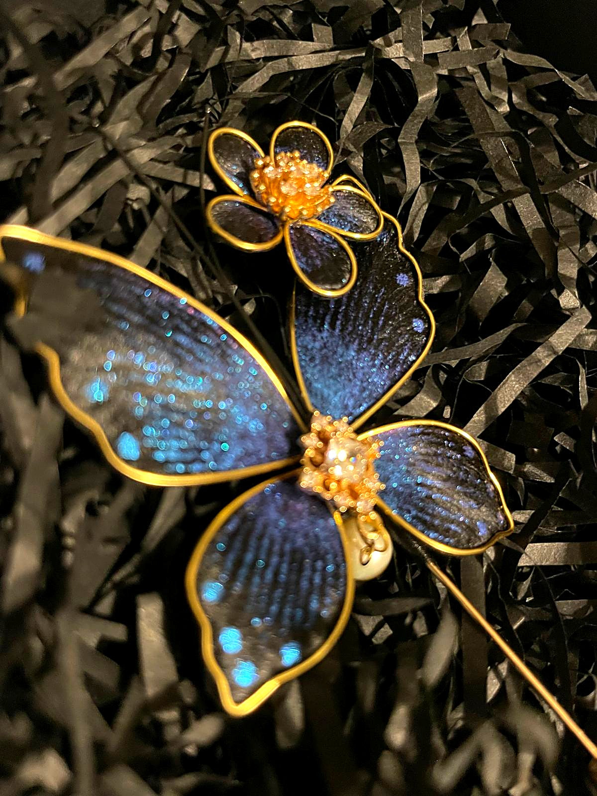 The Ronghua Butterfly Brooch — sapphire silk velvet-flower butterfly with pearl drop, gold stick pin, in its gift box